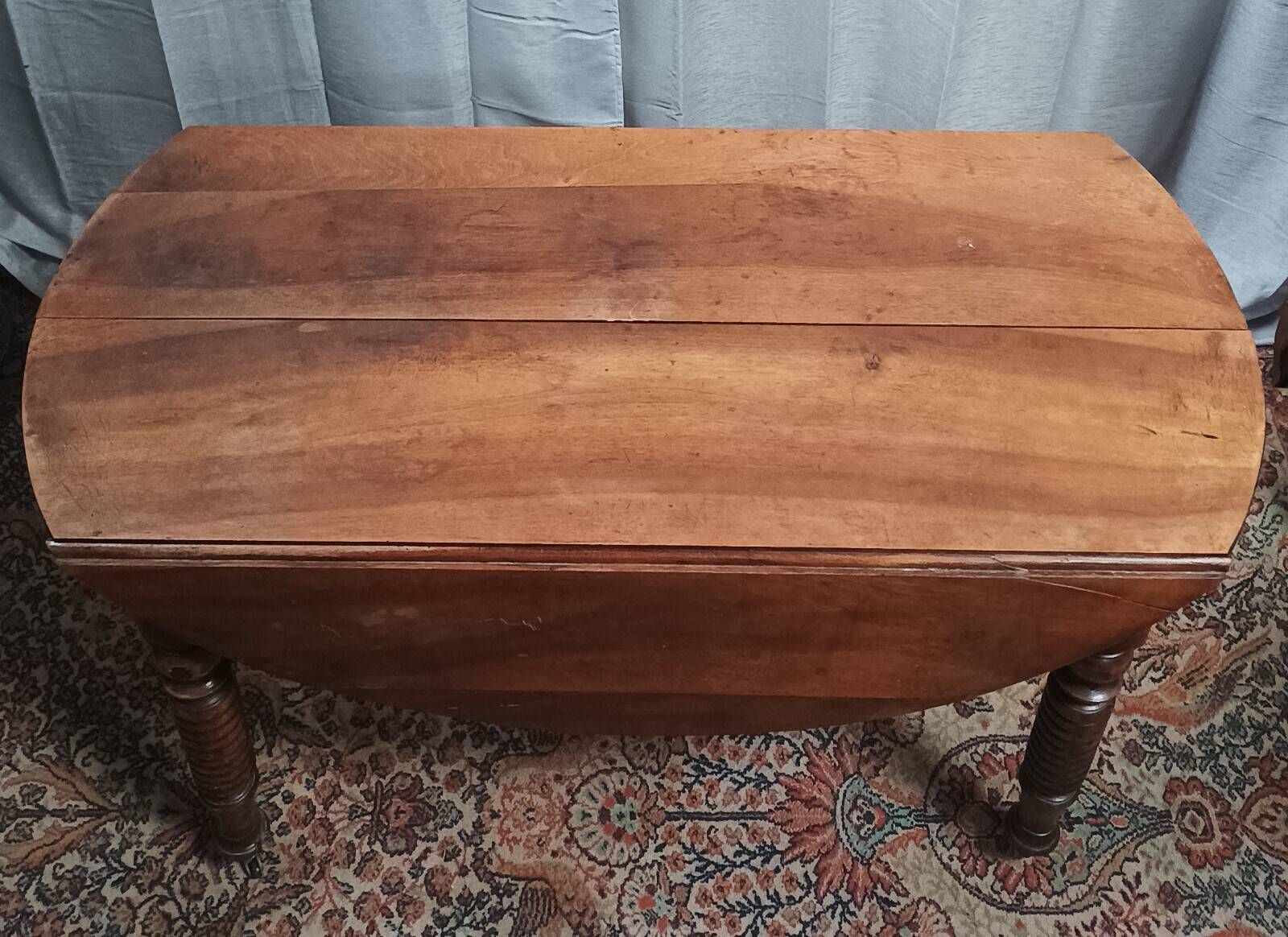 19th-century Louis Philippe walnut drop-leaf table.
