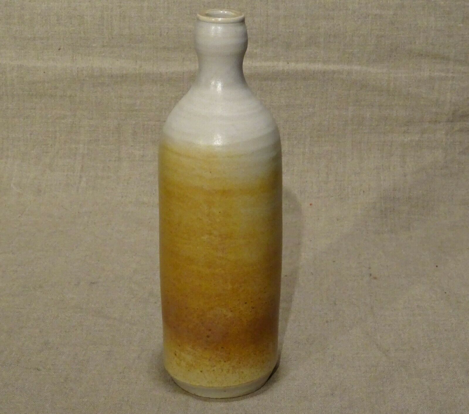 Bottle decorated with Vallauris foliage