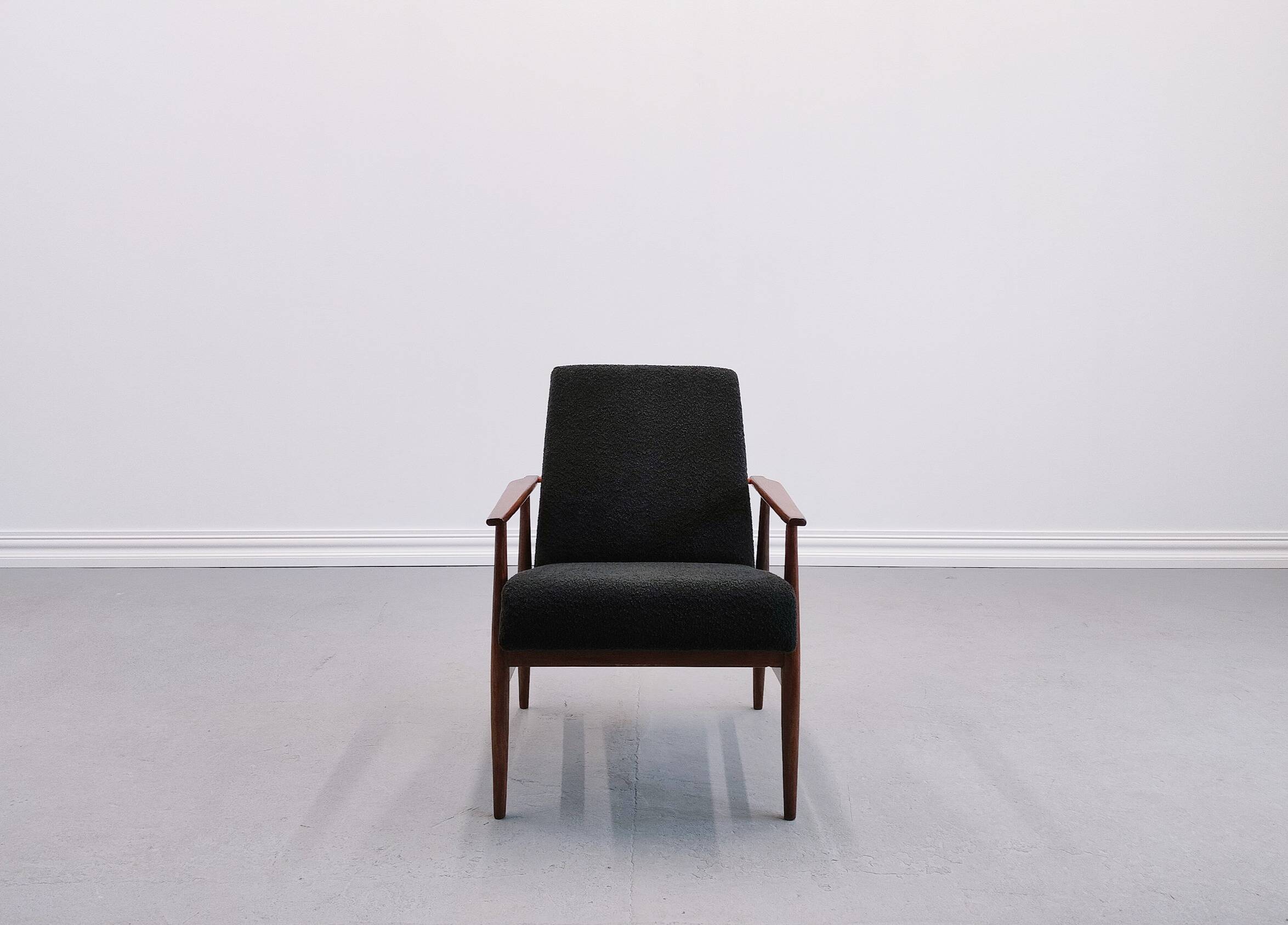 Henryk Lis armchair in black boucle 1960