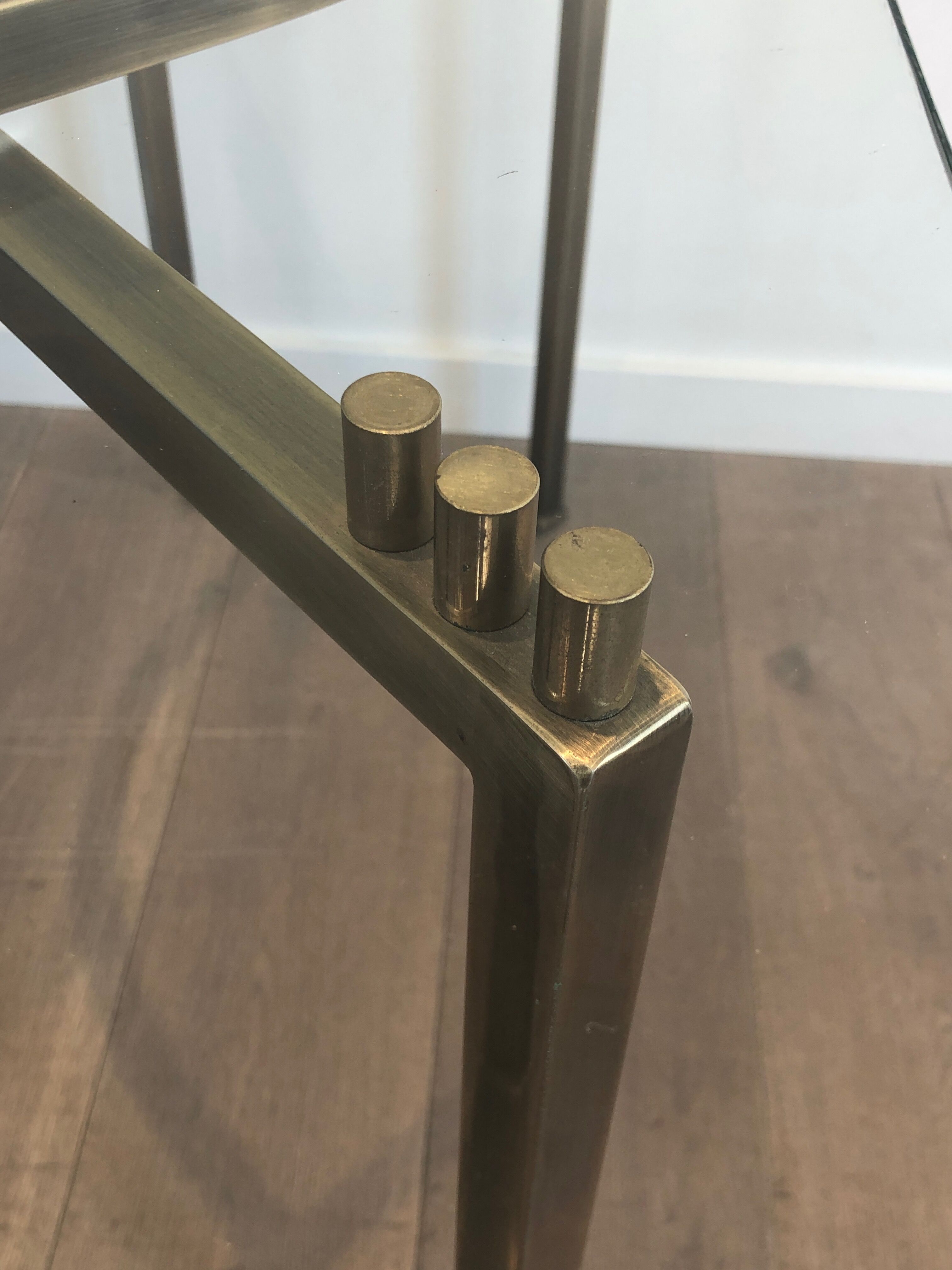 Console in brushed steel and brass and tray formed of a glass slab. French work. Around 1970