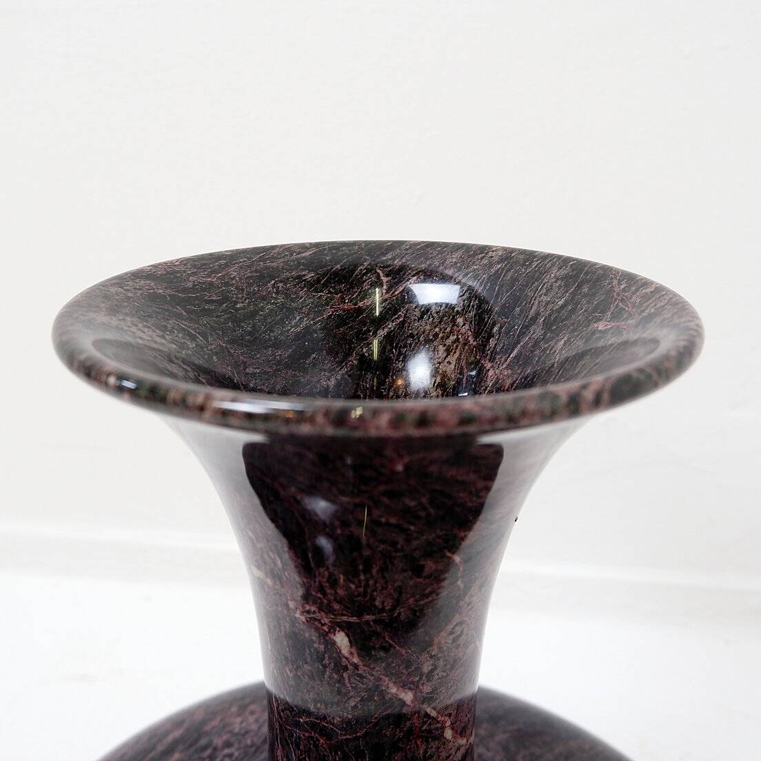 Polished granite vase
