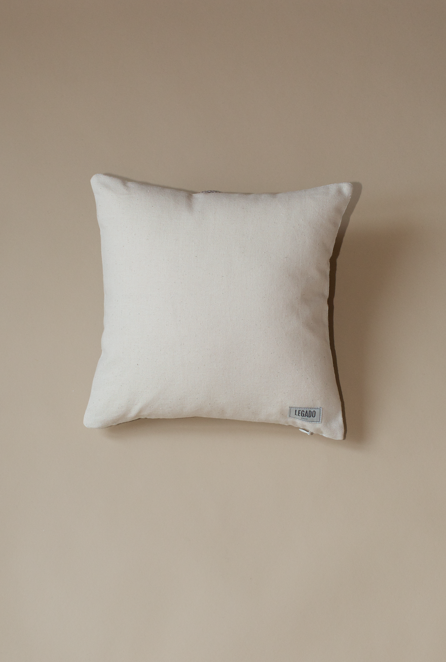 Hand-embroidered cushion