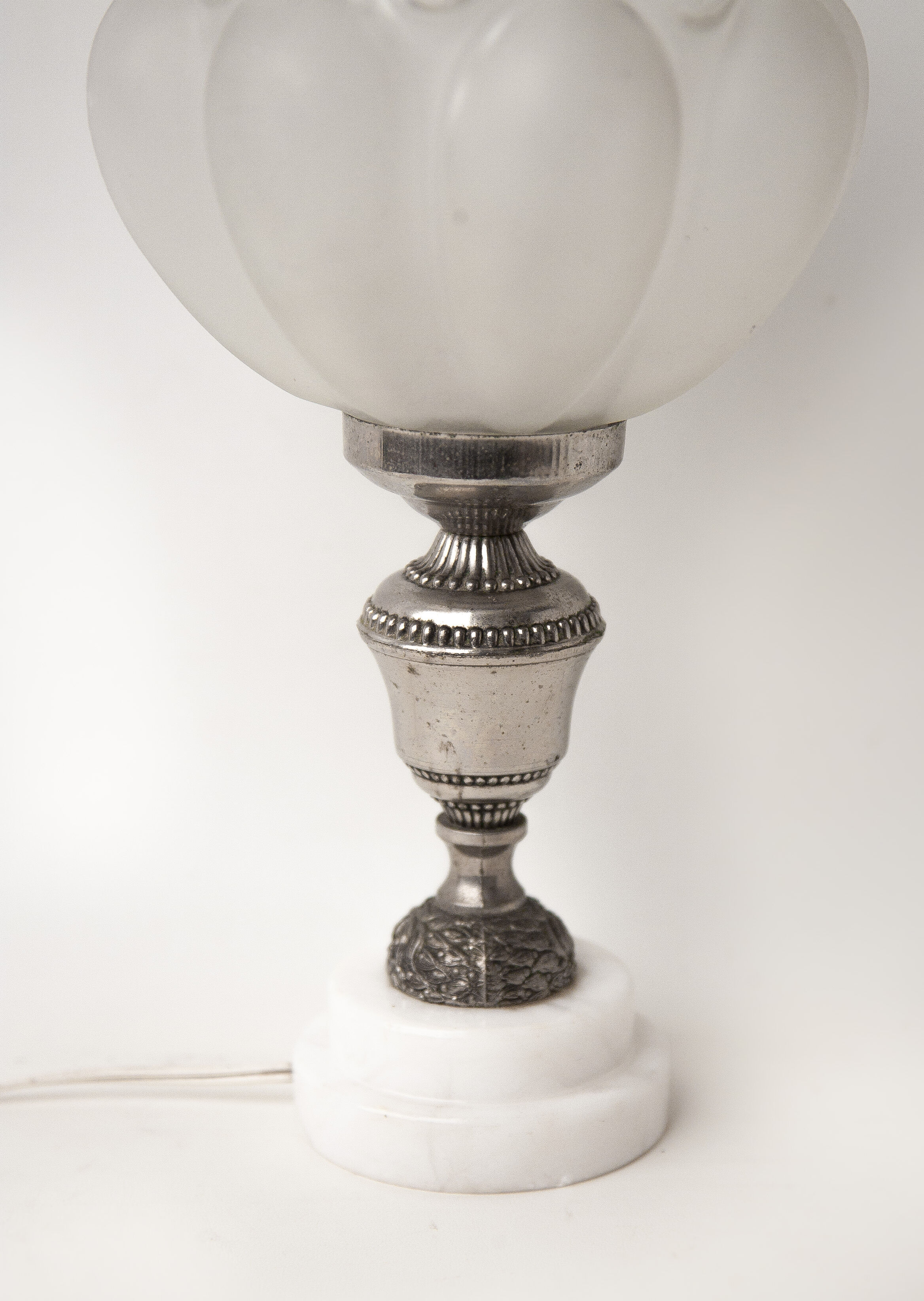 Bedside lamp in moulded glass