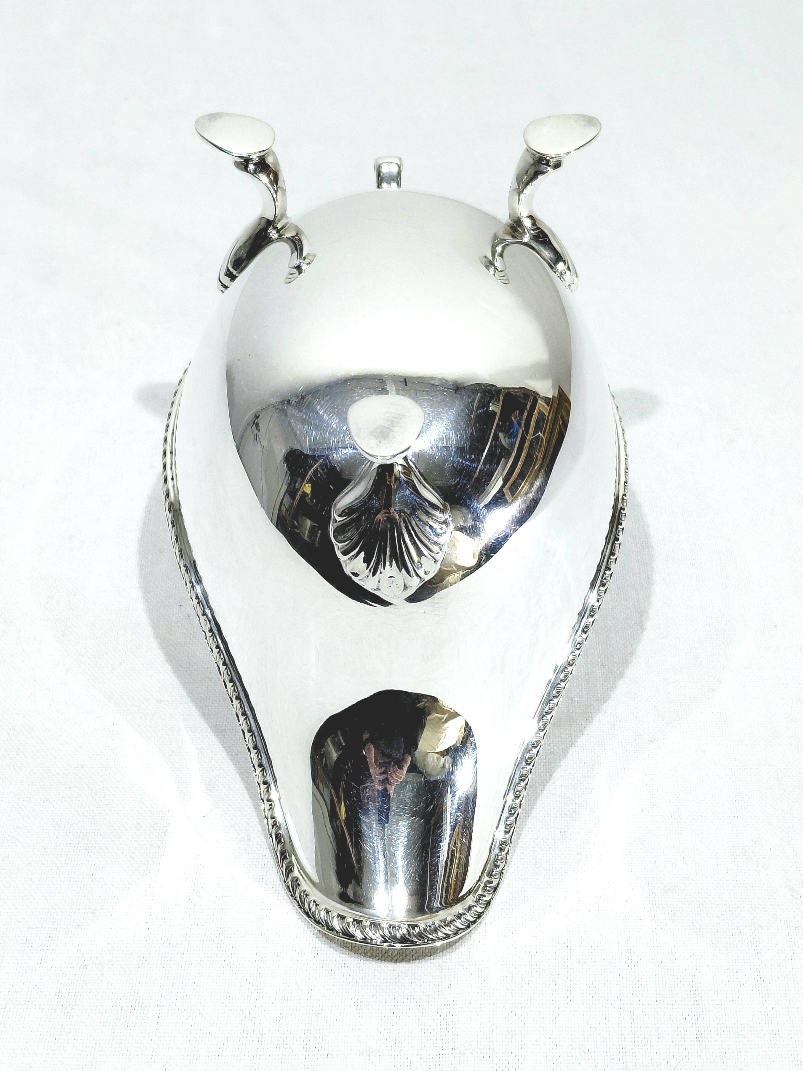 Silver sauceboat, England