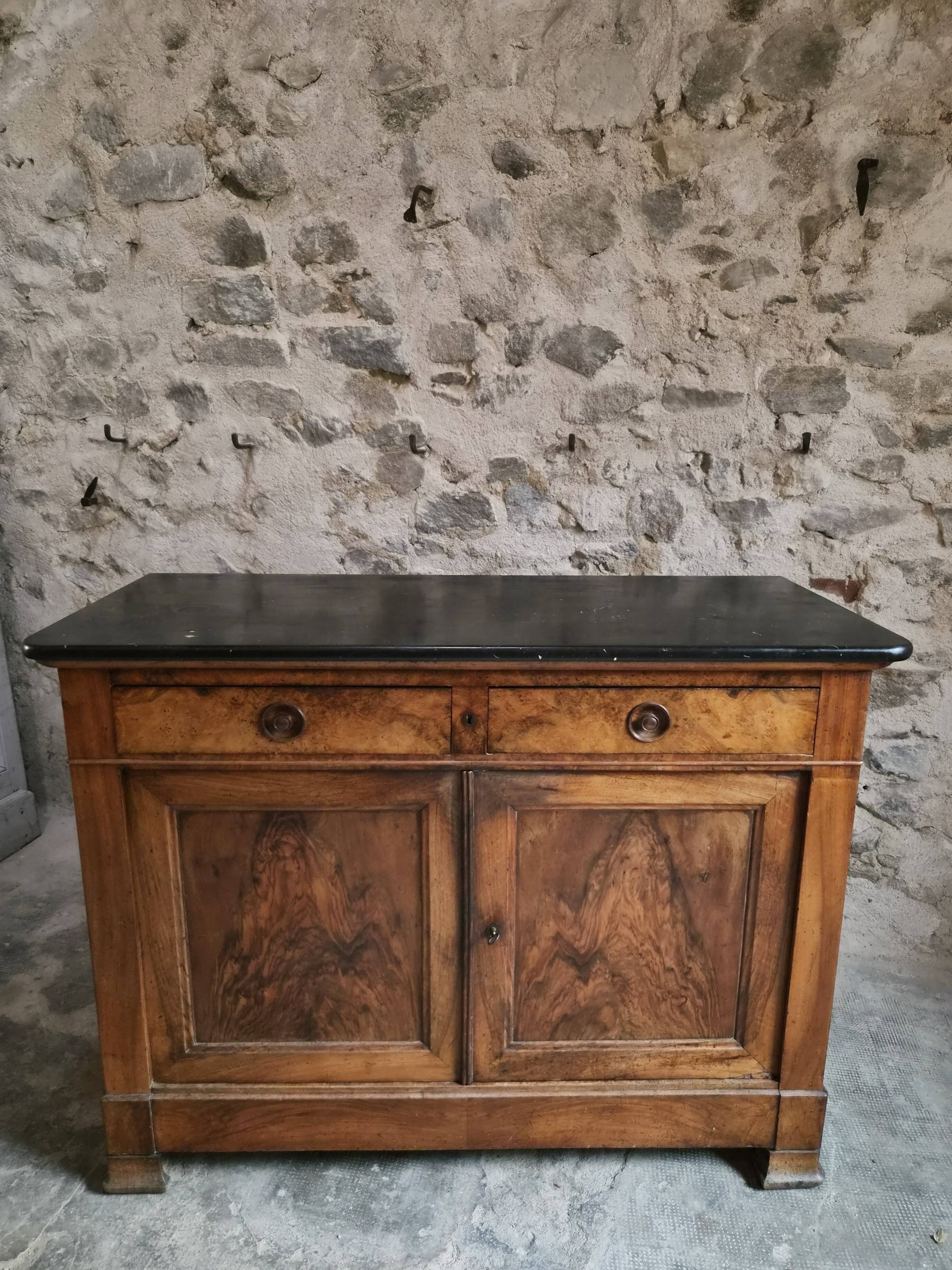 French Louis Philippe walnut buffet with black marble top, France, circa 1840–1860.