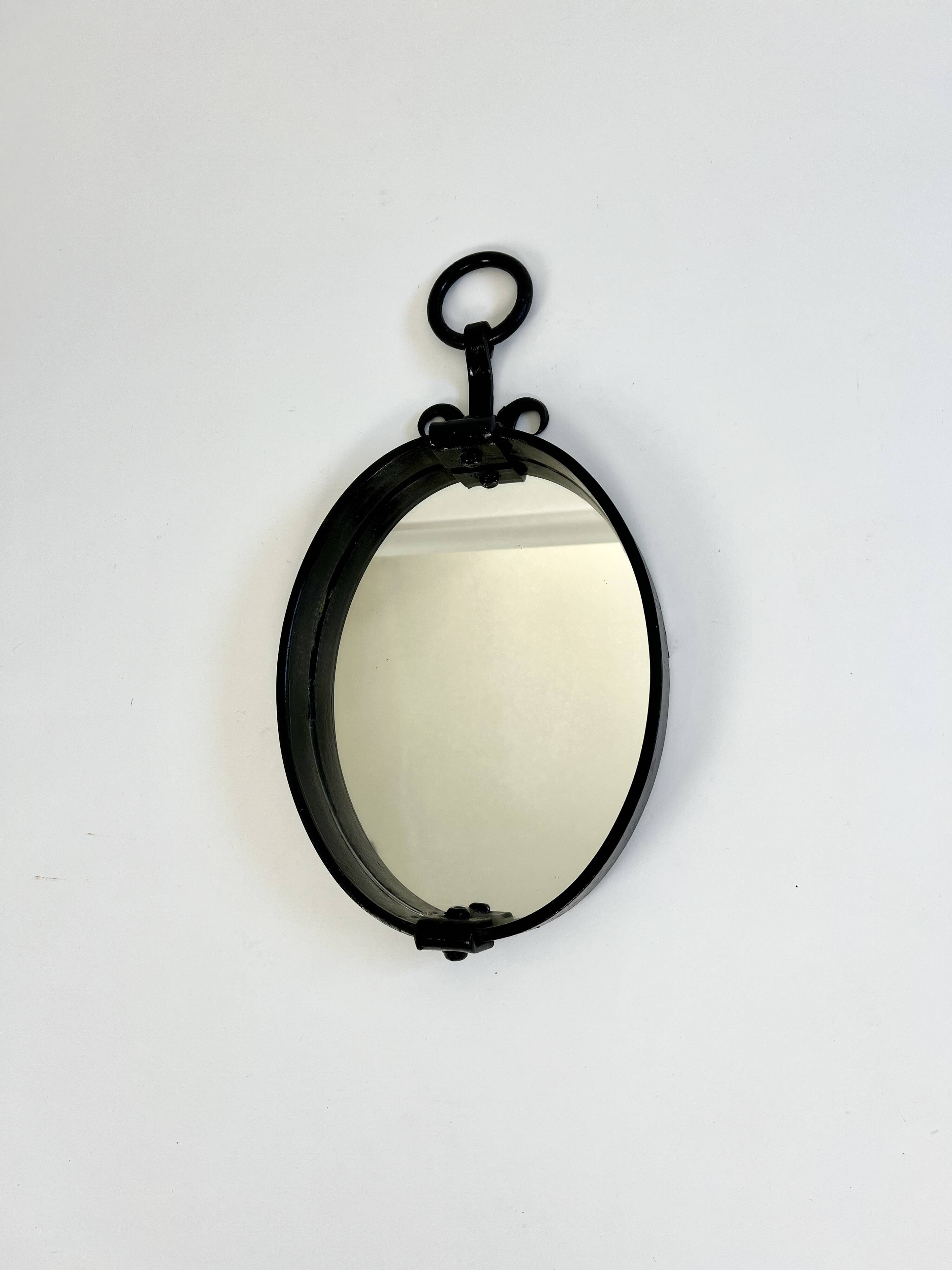 Miroir mural ovale brutaliste du milieu du siècle