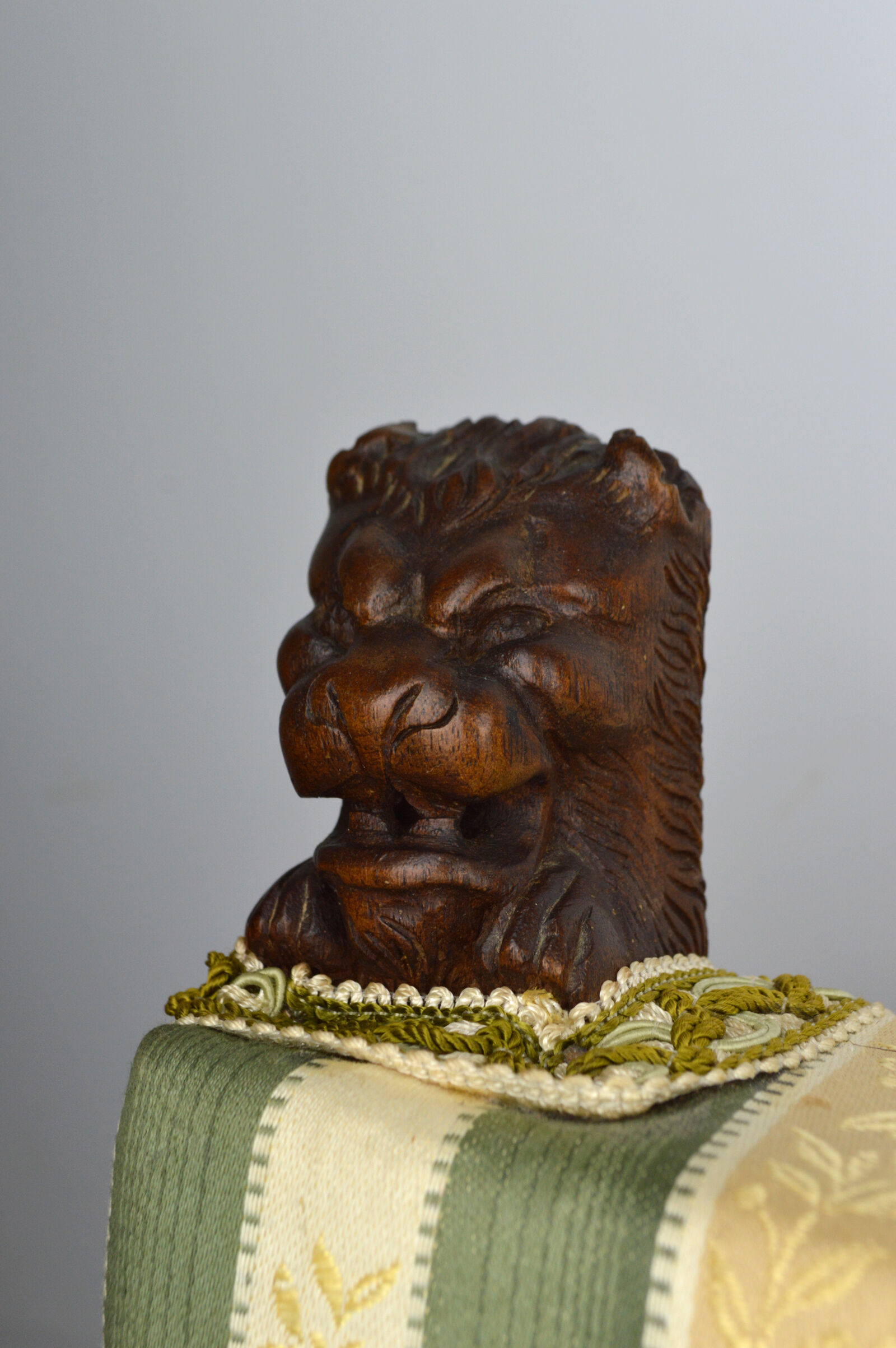 Neo-Renaissance walnut armchair with lion heads, circa 1880