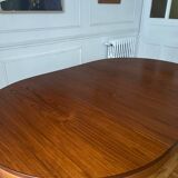 Round extendable rosewood table from the 70s