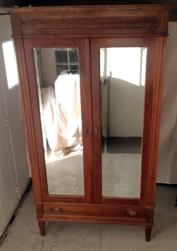 Vintage Parisian glass cabinet.