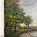 Old oil painting on canvas of a landscape by the pond.