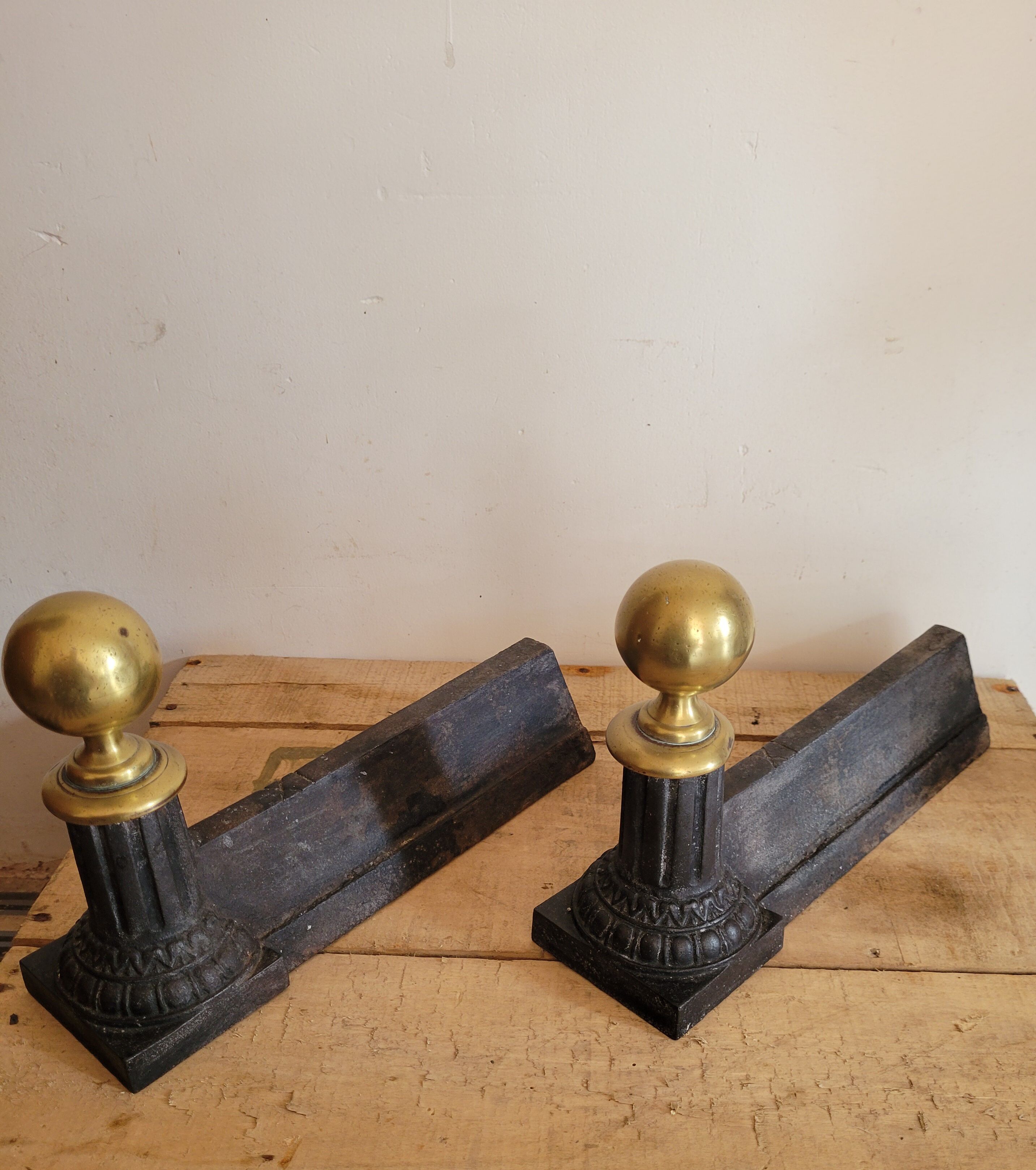 Pair of cast iron and brass chenets