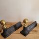 Pair of cast iron and brass chenets