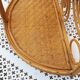Rattan wall shelf