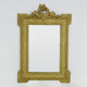 Old wall mirror in wood and gilded stucco, Louis XVI style. XIXth