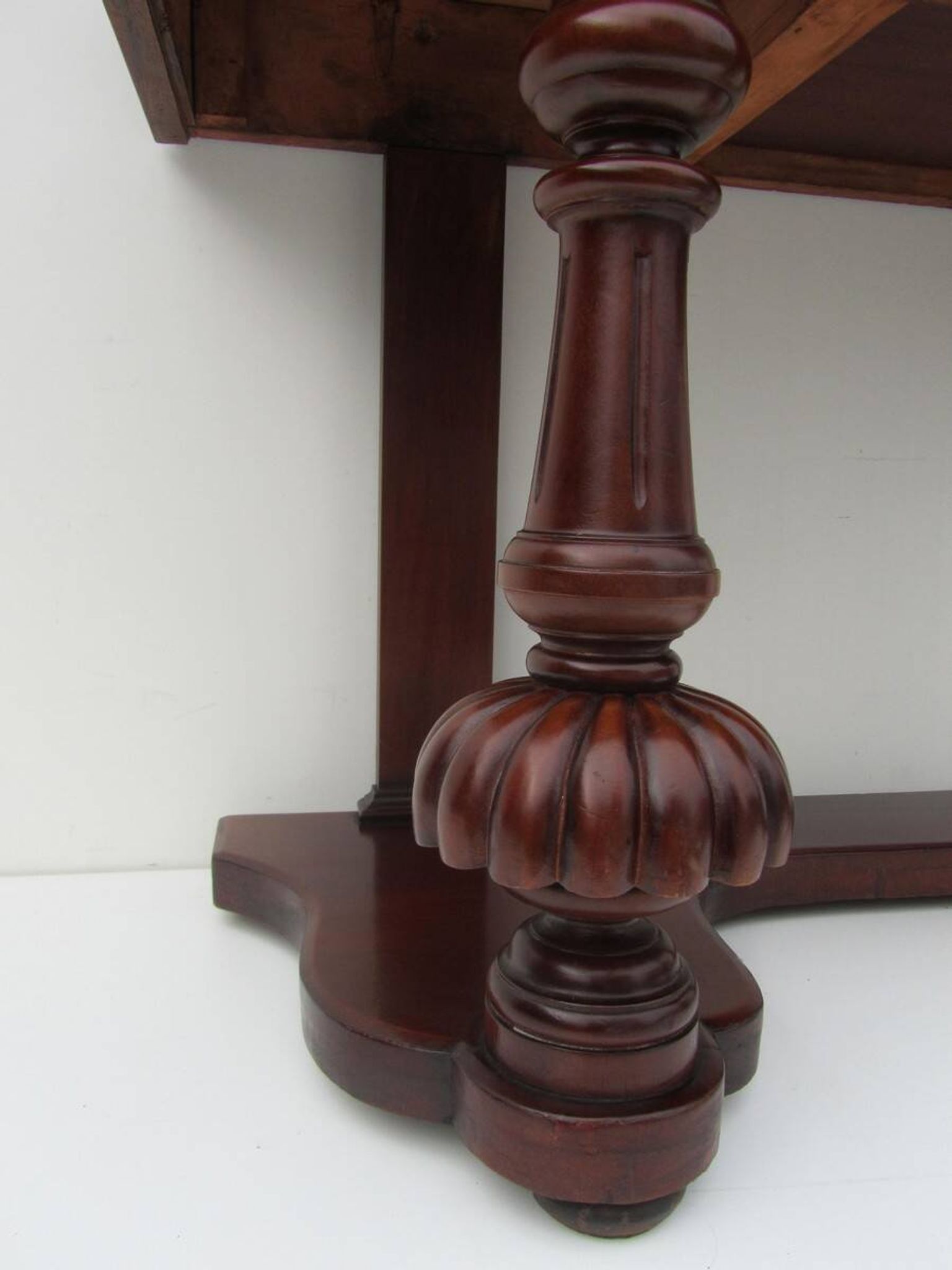 Mahogany and green leather console, 1860-70