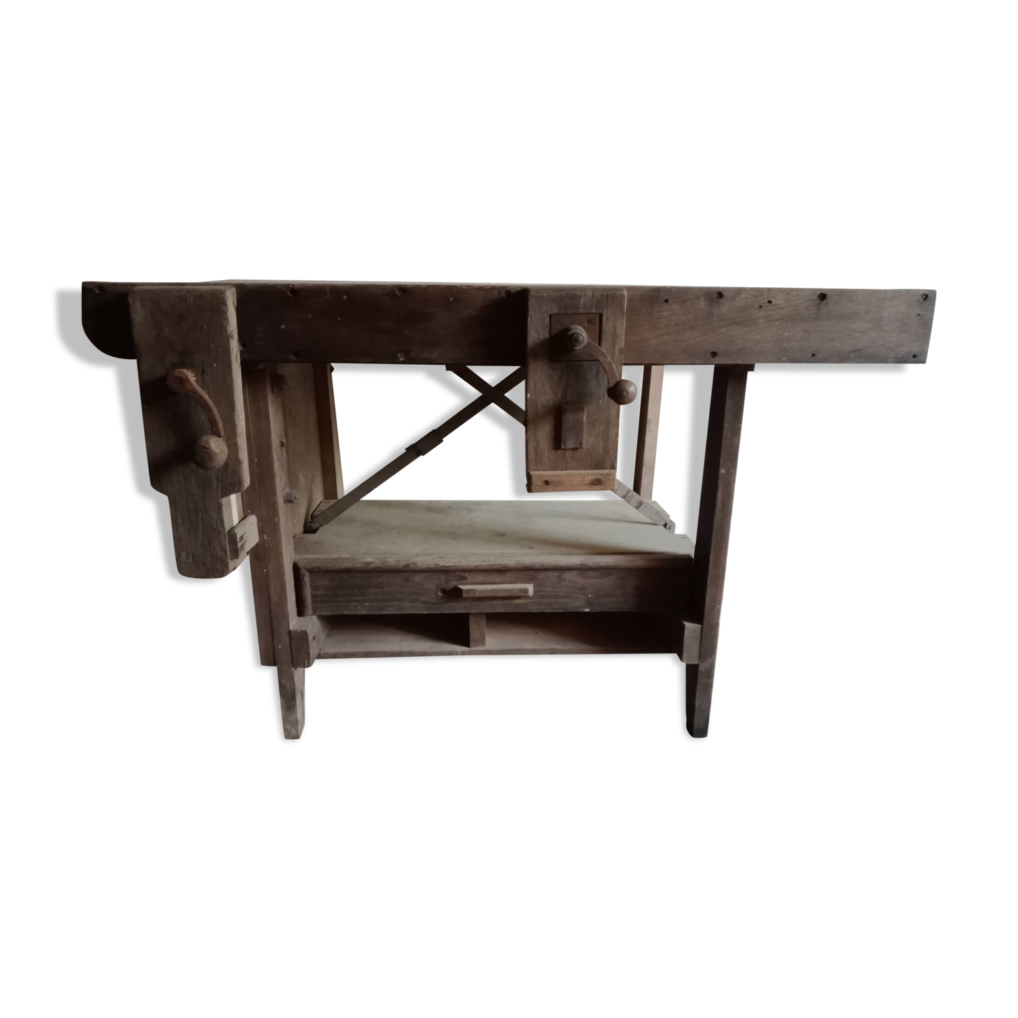 antique workbench with one drawer and two vices