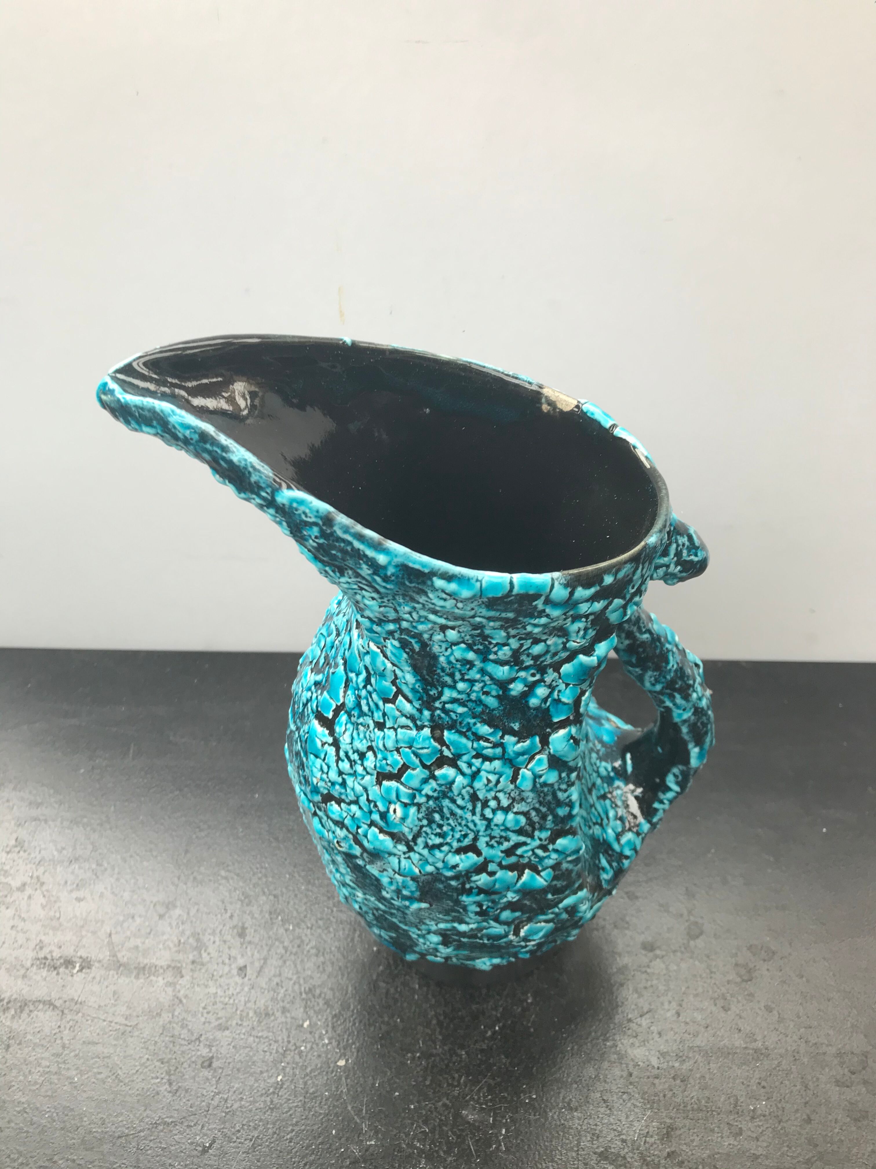 Former black ceramics pitcher