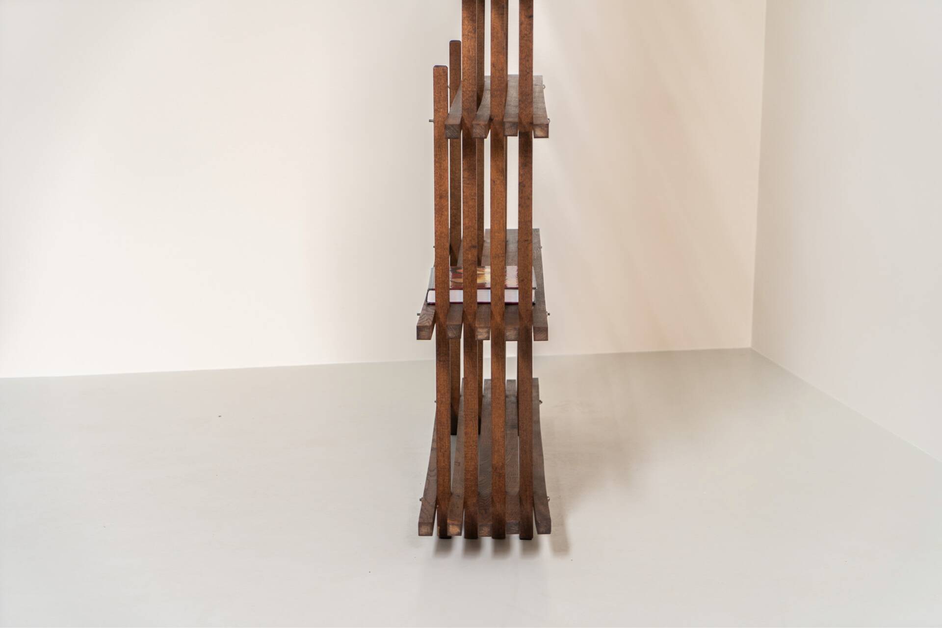 Sculptural wengé slat bookcase (Europe, 1960s).