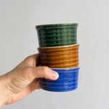Trio of glazed ceramic ramekins