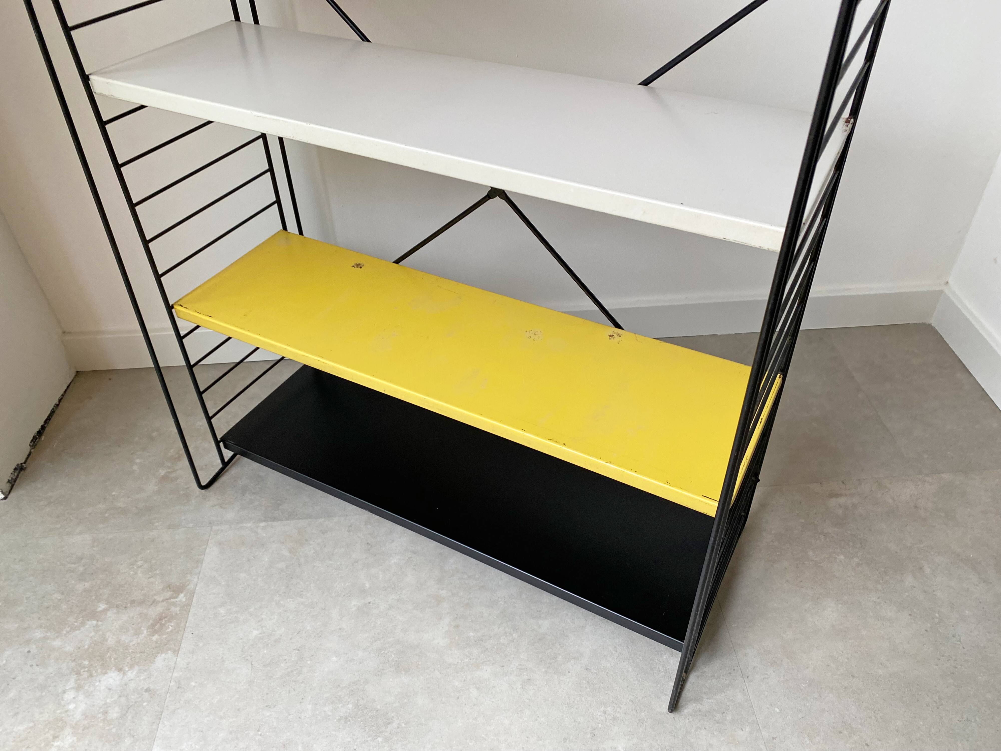 Mid century free standing tomado shelving system / bookcase designed by d. dekker