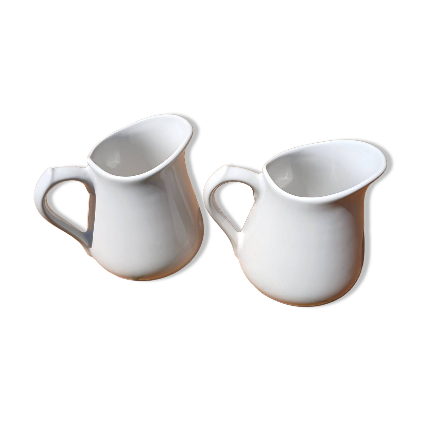 2 vintage milk jugs