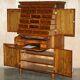 Queen Anne style pedestal commode from around 1710 in walnut and oyster veneer.