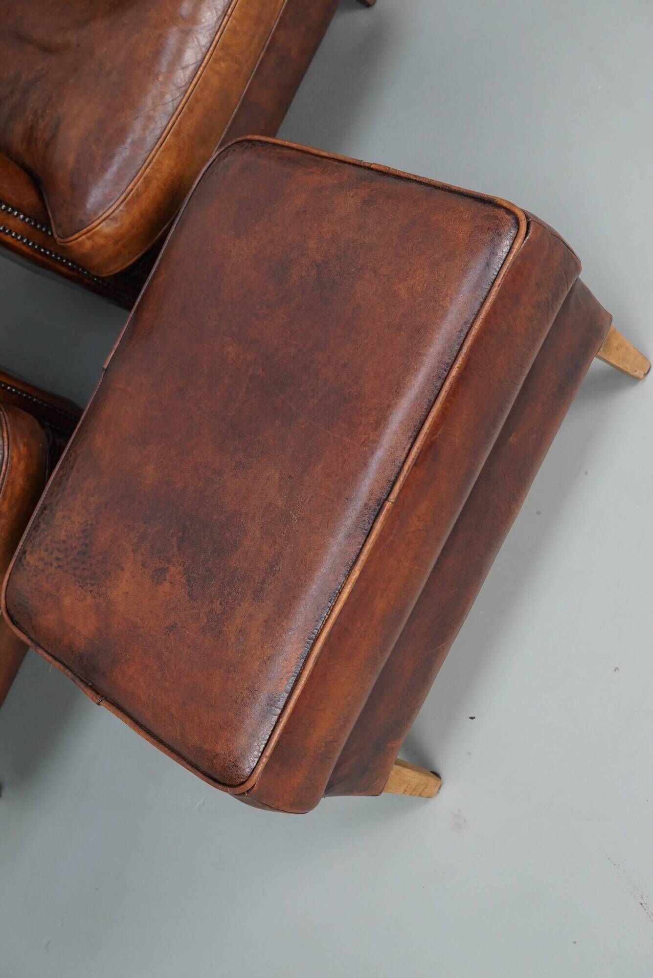 Vintage Dutch cognac coloured leather club chair, set of 2 with footstool