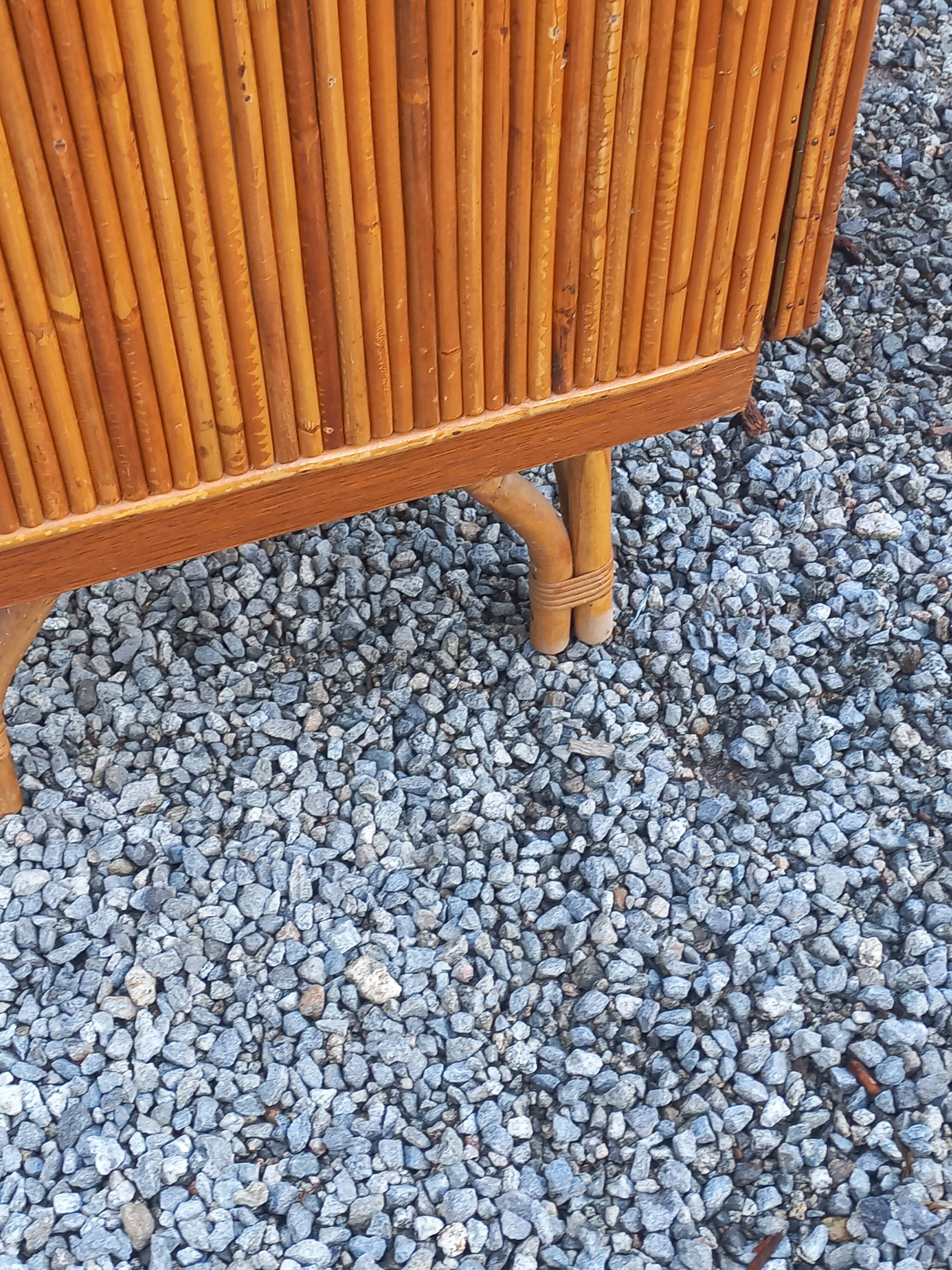 Bamboo and rattan enfilade attributed to Audoux and Minet.