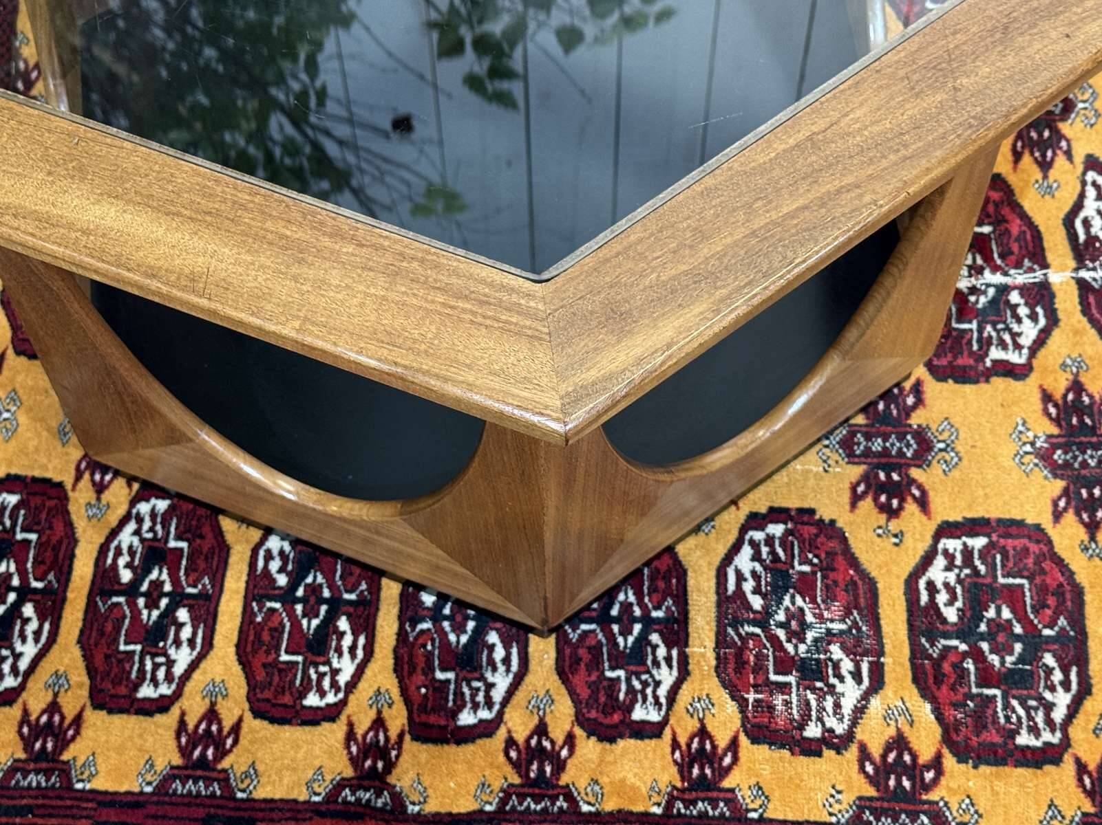 1970s octagonal GPlan gueridon in teak with a glass top.