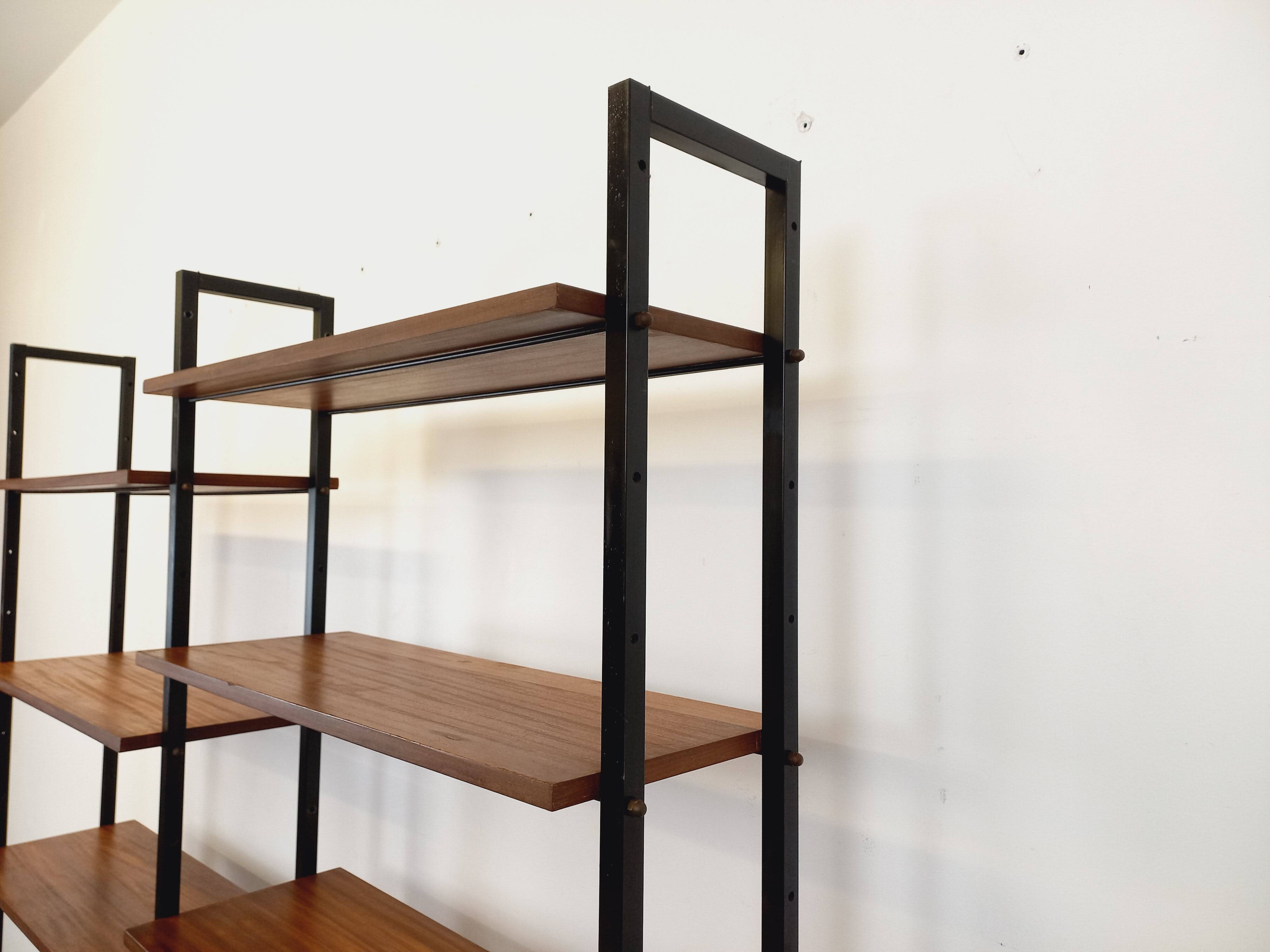 Vintage Italian double modular bookshelf in teak and metal.