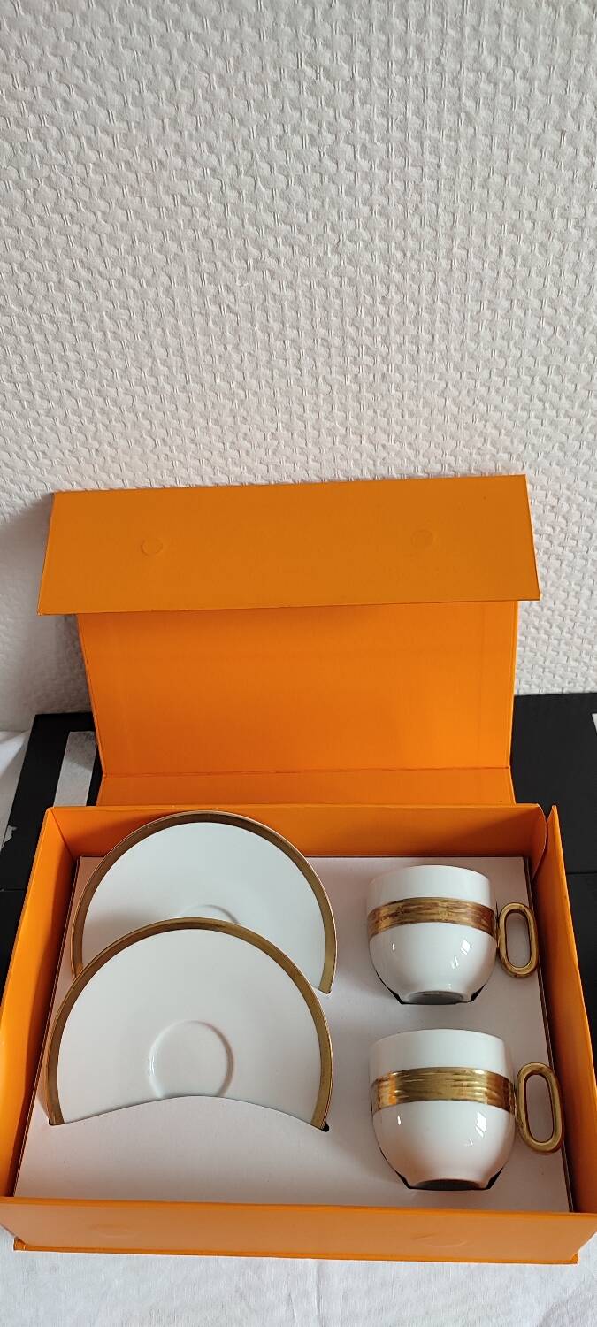 Médard de noblat cups and saucers.