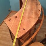 Vintage bar counter with natural wood stools