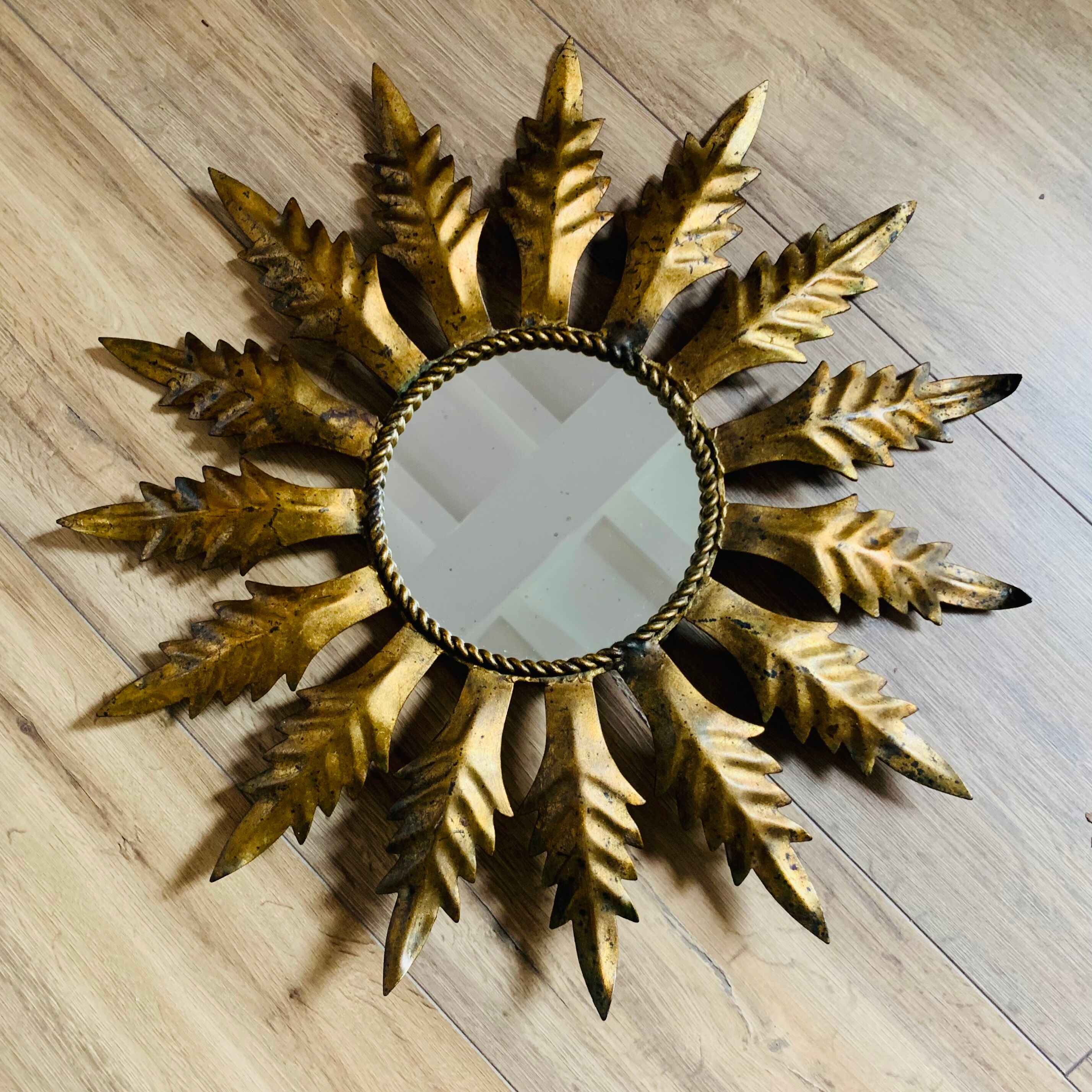 Golden metal sun mirror