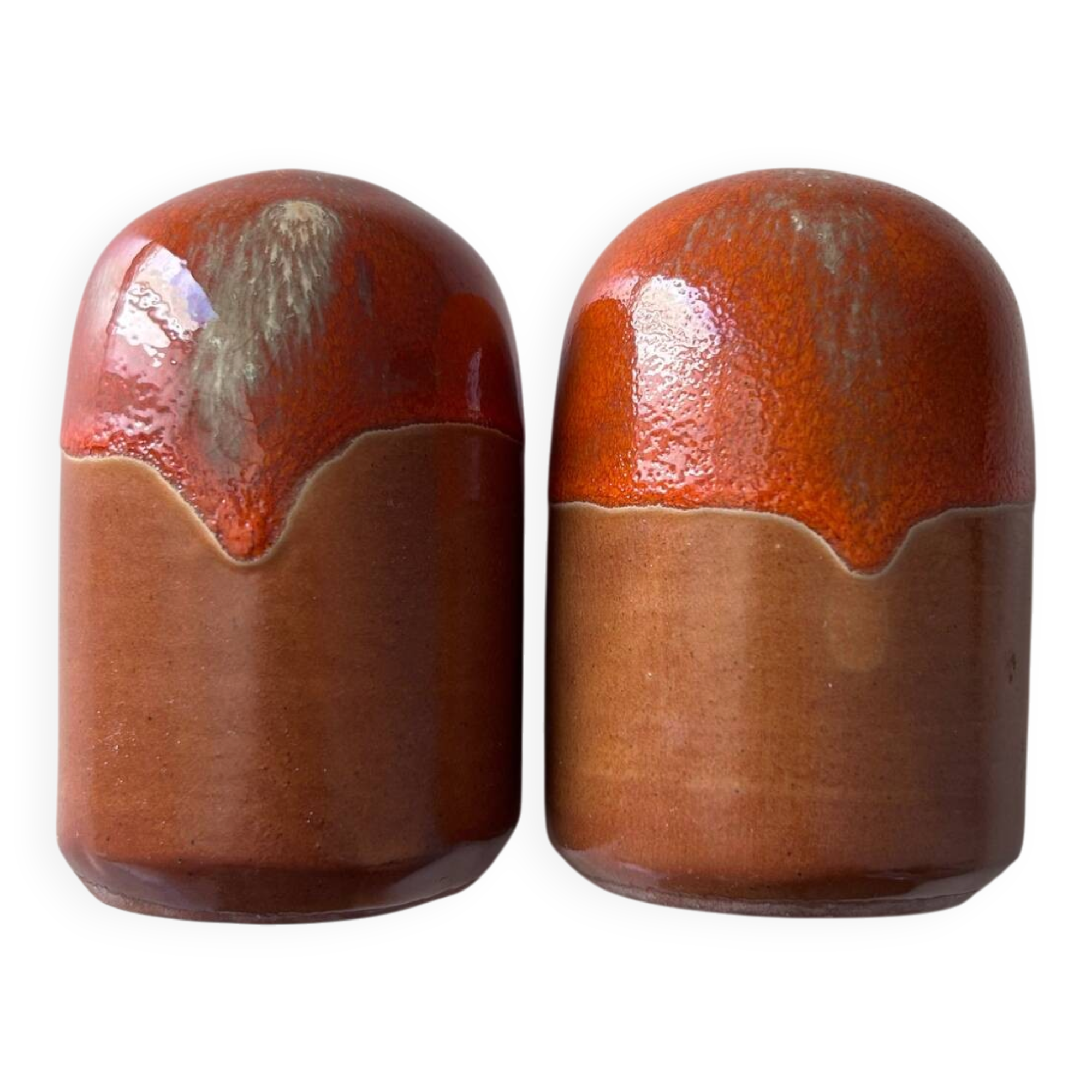 Salt and pepper shakers in orange stoneware
