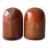 Salt and pepper shakers in orange stoneware