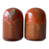 Salt and pepper shakers in orange stoneware