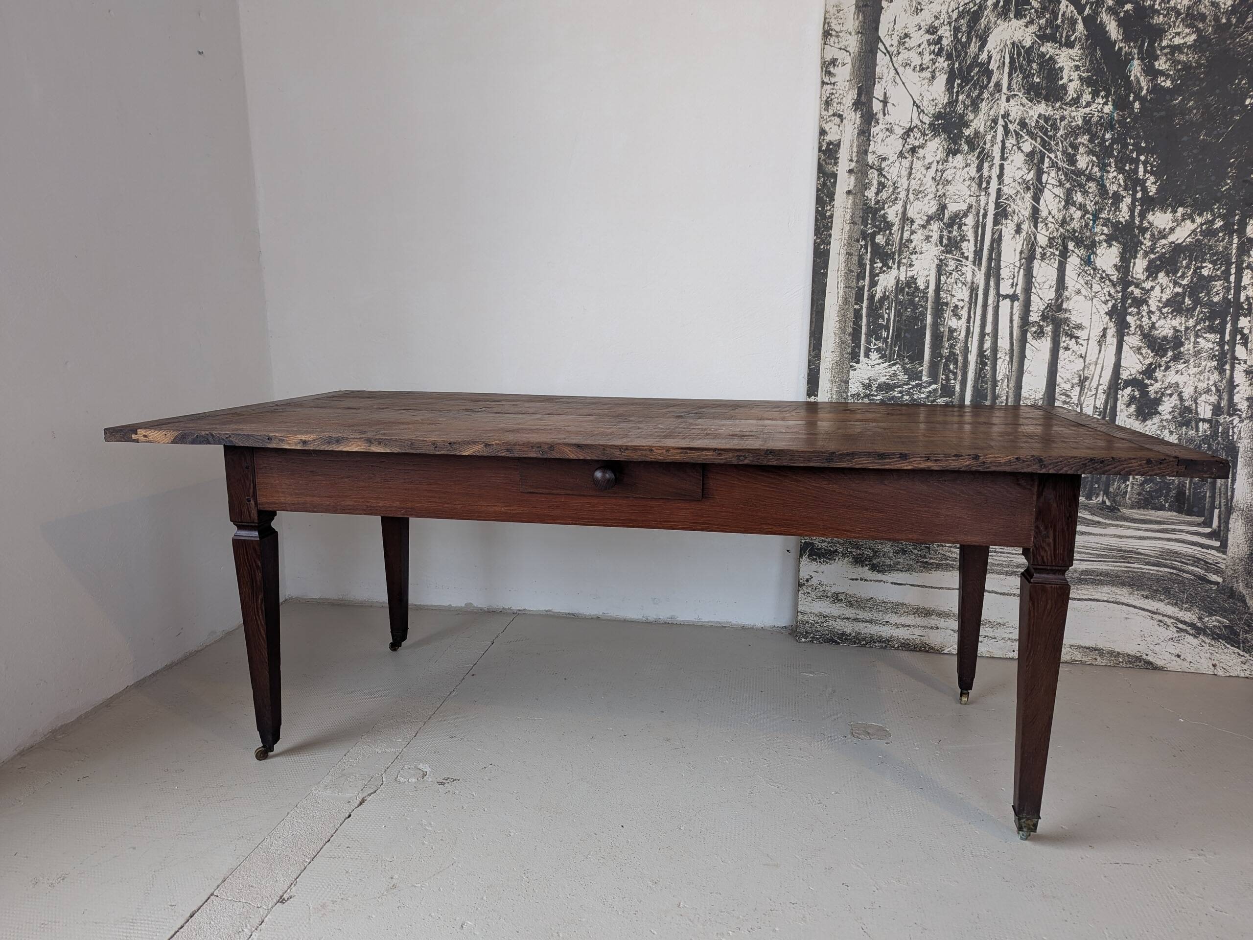 Campaign table in solid oak, Directoire style.