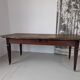 Campaign table in solid oak, Directoire style.