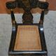 Georgian side bergère circa 1825, ebonised and hand-painted in Baltimore style.