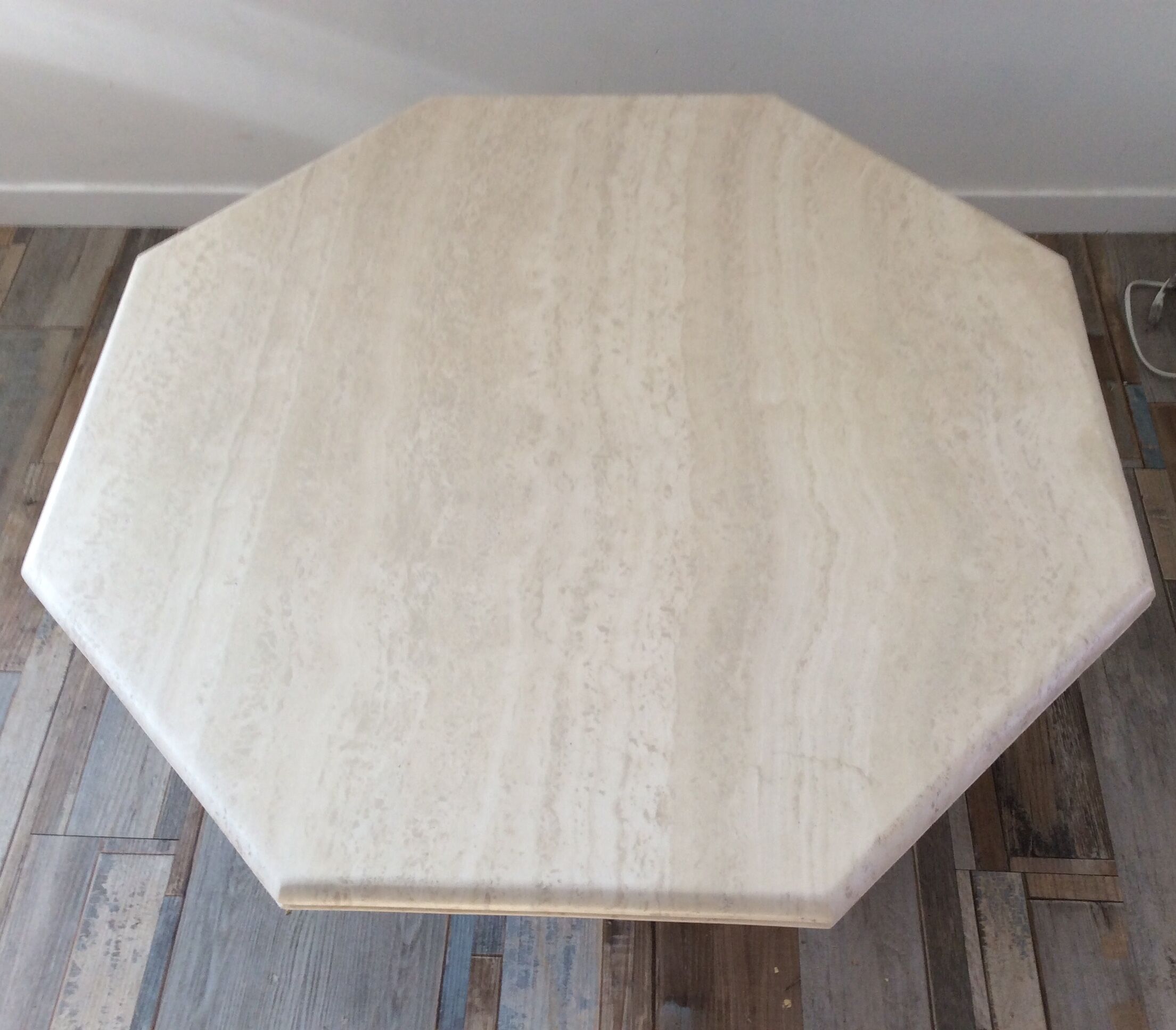 Octagonal coffee table in travertine