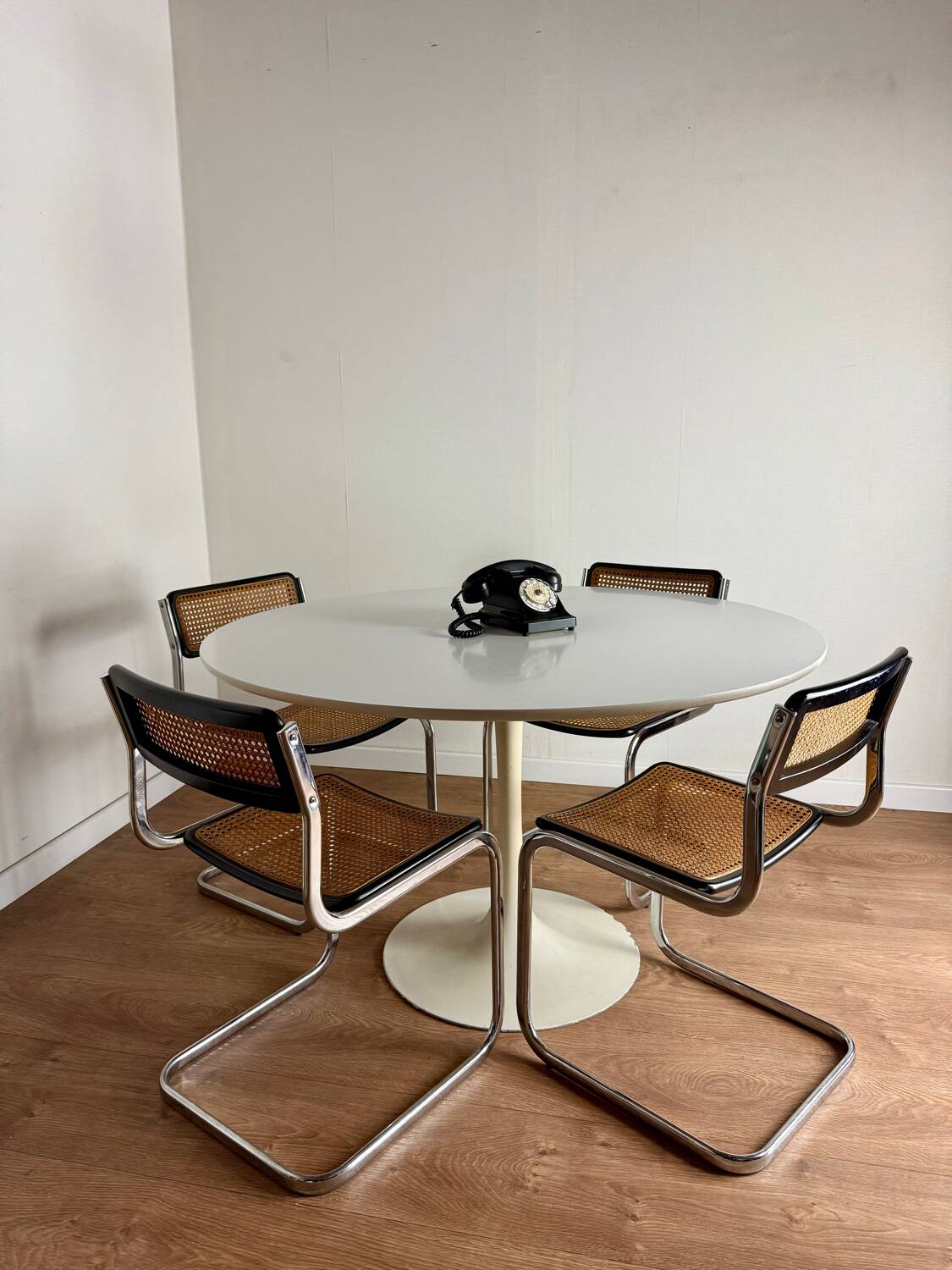 White round tulip-legged table attributed to Arkana