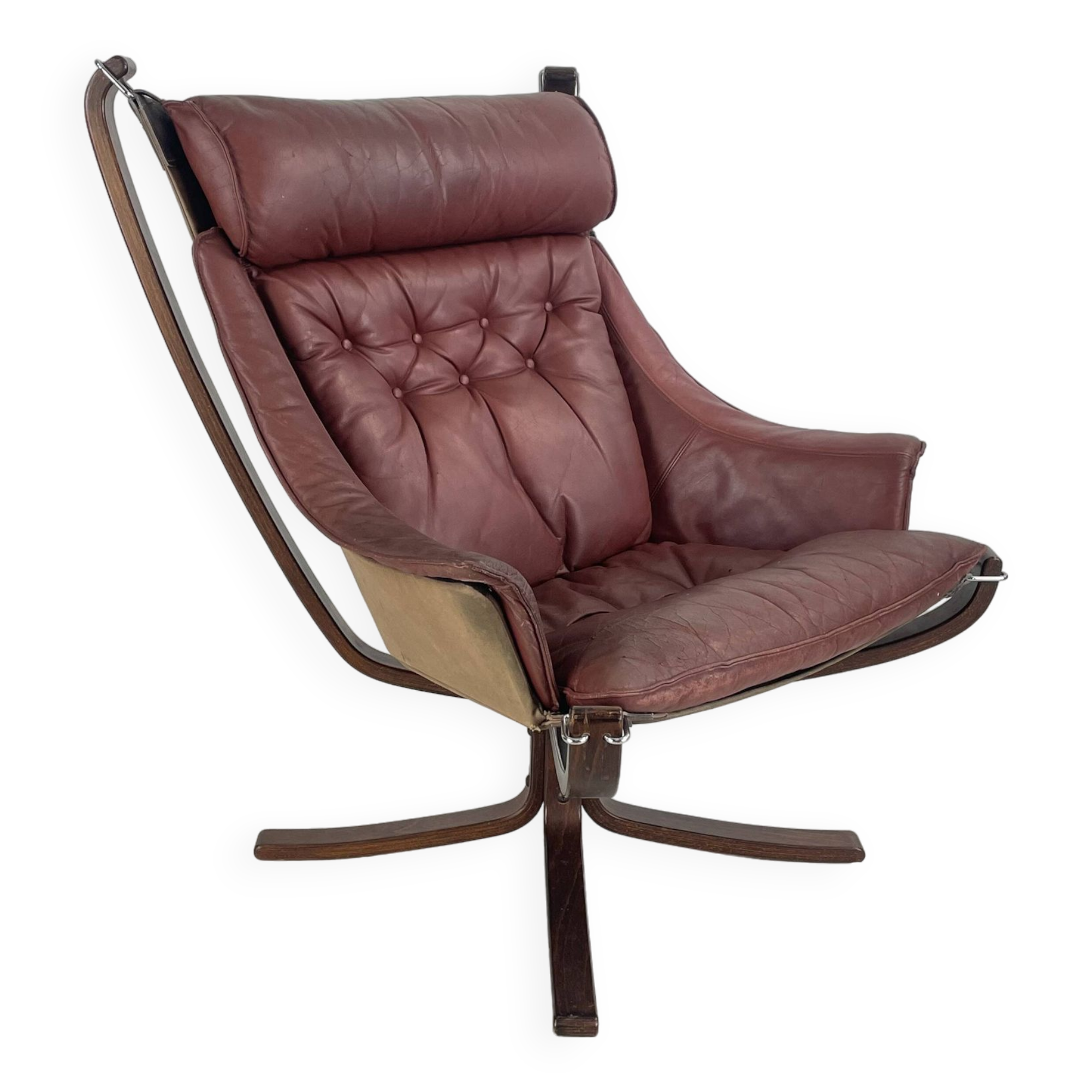 Vintage winged leather high backed Falcon chair designed by Sigurd Resell