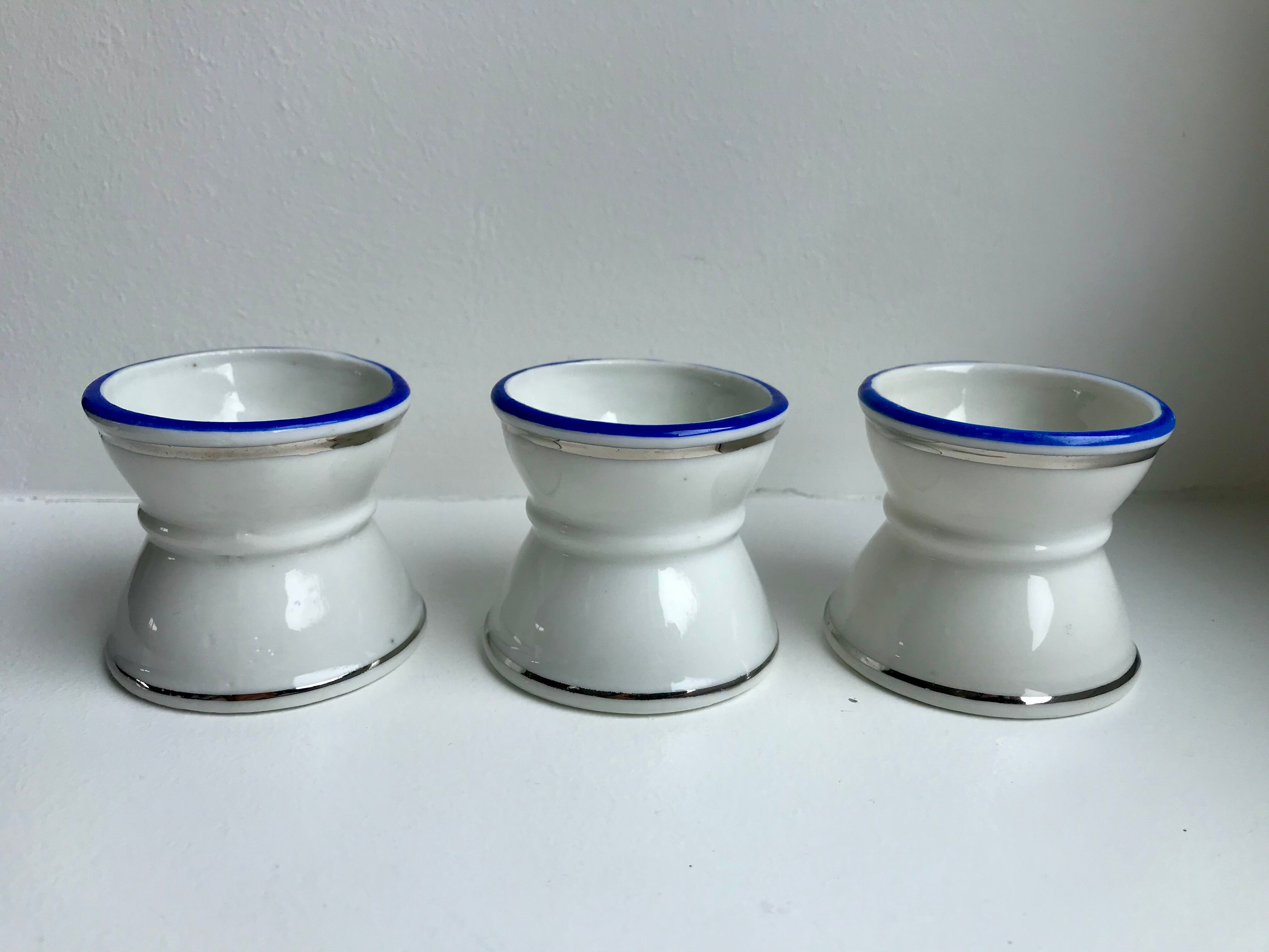 Trio of shells diabolo white edging silver and bright blue 50s