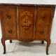 Transitional style commode with a protruding front, in marquetry wood, 20th century.