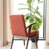 Vintage orange curly papaya armchair 1970