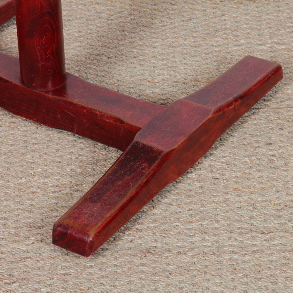 Square wooden dining table with a pedestal from the 1980s.