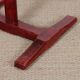 Square wooden dining table with a pedestal from the 1980s.