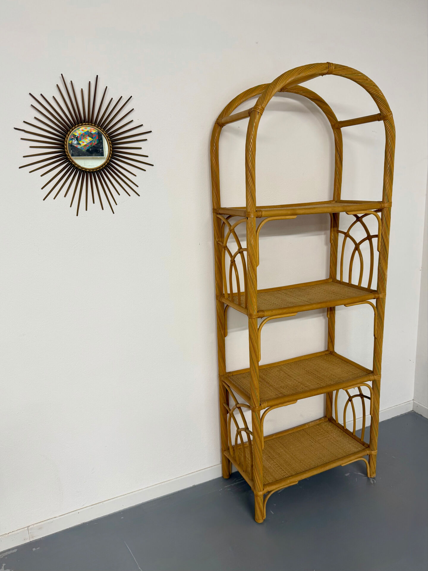 Large woven rattan bookshelf designed in the 1970s.