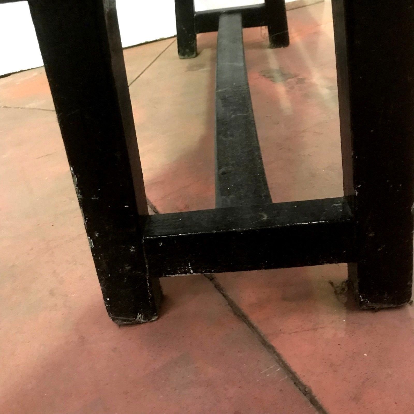 Patinated black minimalist bench