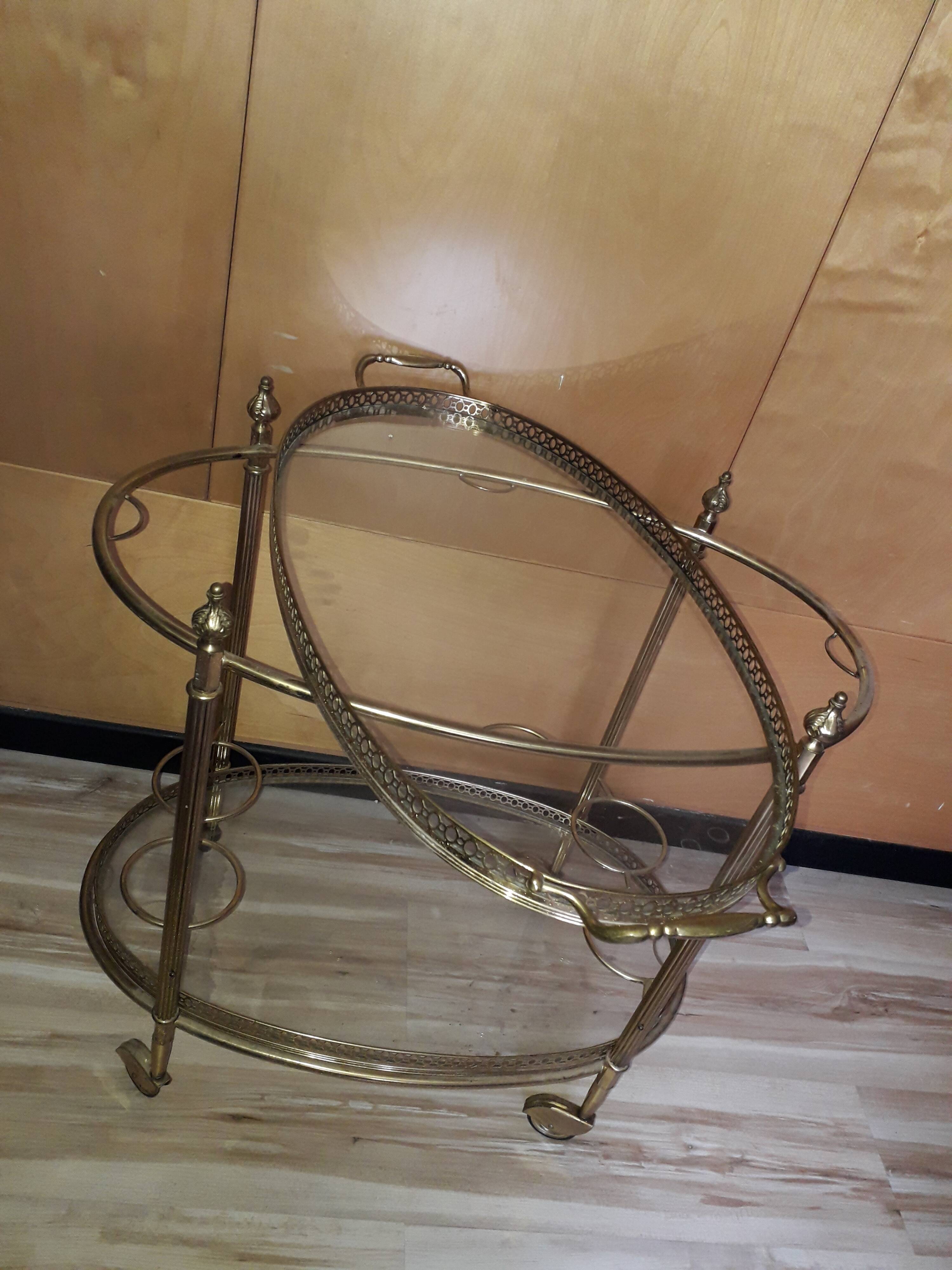 Dessert on brass wheels and glass door bottles year 60